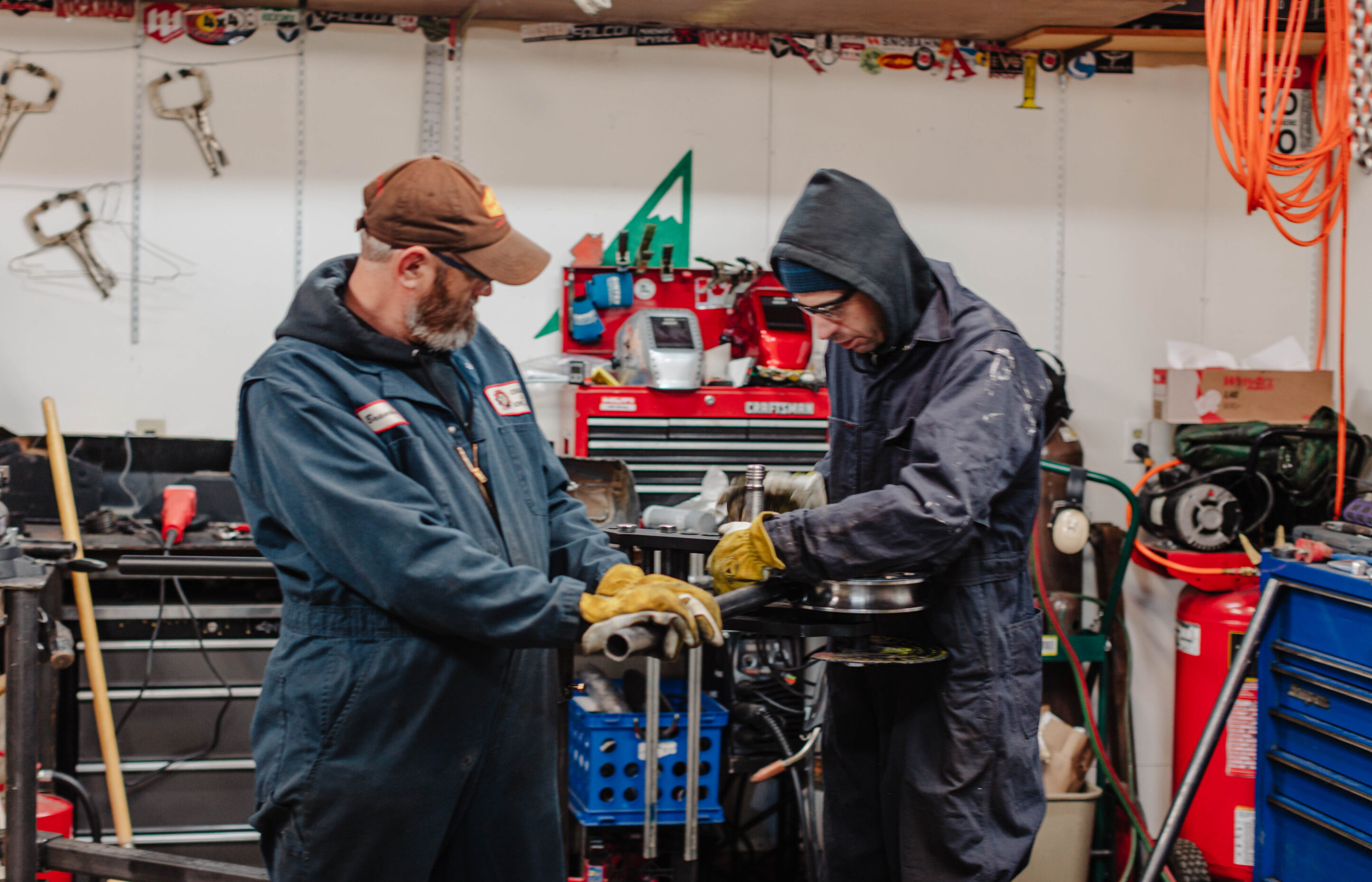 Mechanics working on a jeep